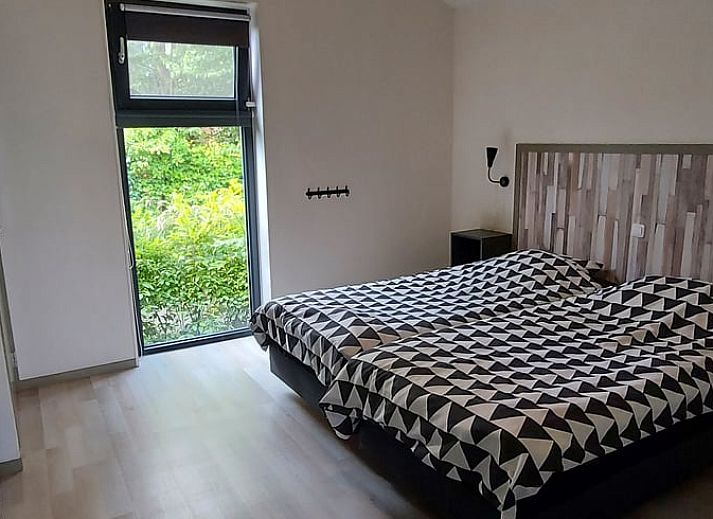 Spacious living room in vacation home Cottage in Jannum near Dokkum, located in the Frisian countryside in Friesland.