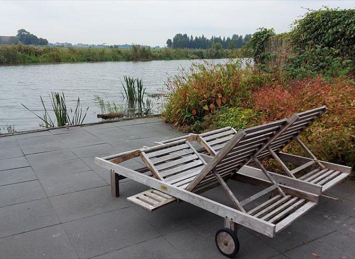Dining and sitting area in Cottage in Jannum near Dokkum, vacation home in the Frisian countryside.
