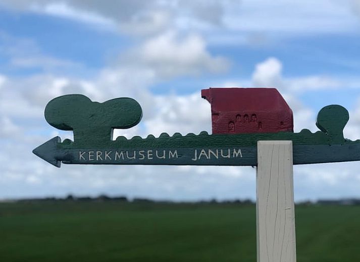 Cozy reading chair overlooking nature at Cottage in Jannum near Dokkum, Friesland.