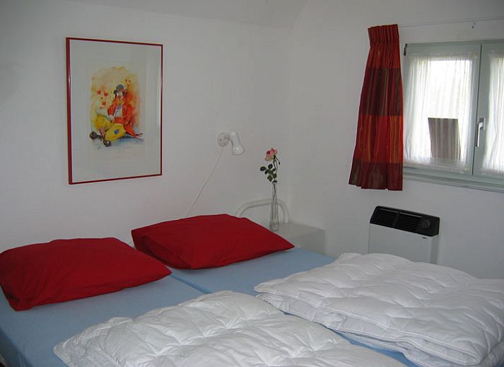 Het Kleine Huis bungalow met tuin en waterpartij in Lauwersmeer, Friesland, biedt rust en natuur op het Friese platteland.