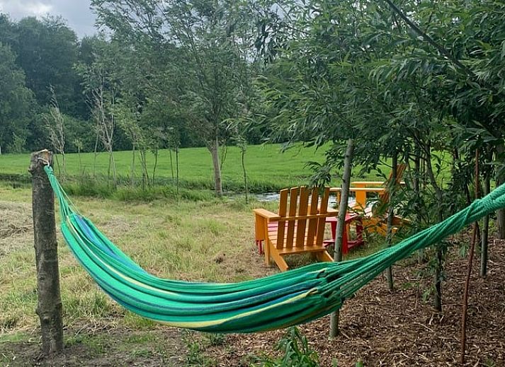 Gezellig terras van Vakantiehuisje in Tijnje, ideaal voor ontspanning in de frisse lucht van Friesland.