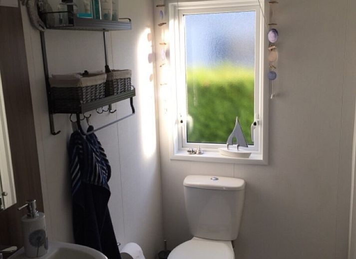 Stijlvolle zithoek in Heide Lodge Comfort, vakantiehuis in Lathum, Gelderland.