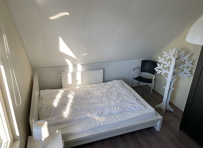 Zand Lodge in Lathum, Gelderland showcases a stylish exterior with modern architecture, perfect for a vacation in the River Region.