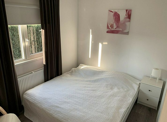 Zand Lodge in Lathum, Gelderland showcases a stylish exterior with modern architecture, perfect for a vacation in the River Region.