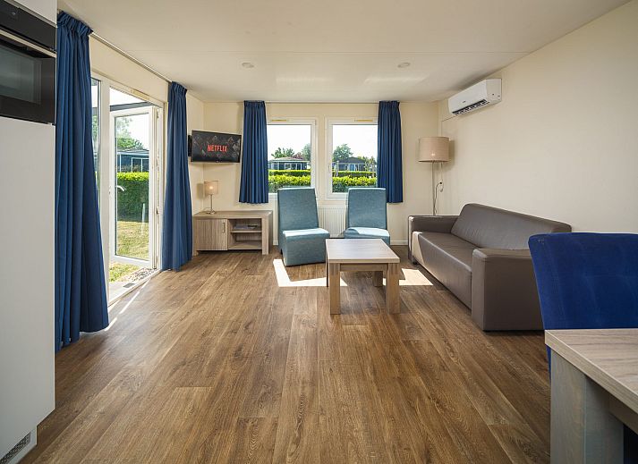 Gezellige Veluwe Lodge in Lathum met terras en moderne afwerking, ideaal voor een ontspannen vakantie in het Rivierengebied.