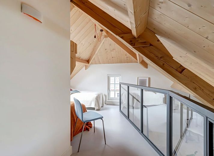 Knusse woonkamer in Huisje in Culemborg, vakantiehuis in Rivierengebied, Gelderland met gezellige inrichting.