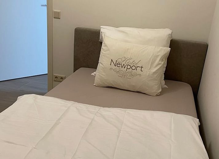 Charmante buitenkant van Vakantiehuisje in Tricht, Gelderland, met uitnodigend terras.