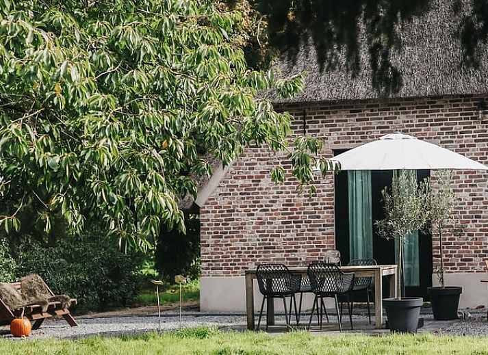 Relaxing bathroom experience at Holiday Home in Altforst, Gelderland with candles for a serene atmosphere.