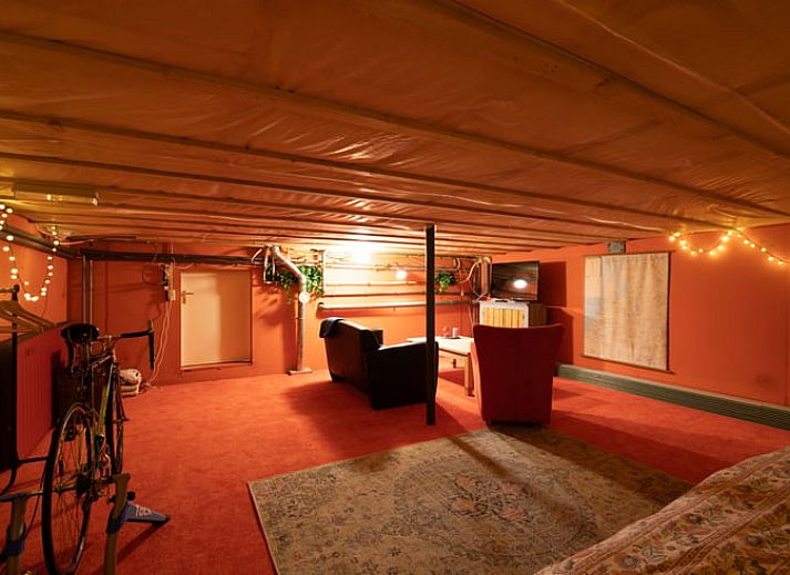 Spacious waterfront terrace at Cottage in Maasbommel, perfect for enjoying nature.