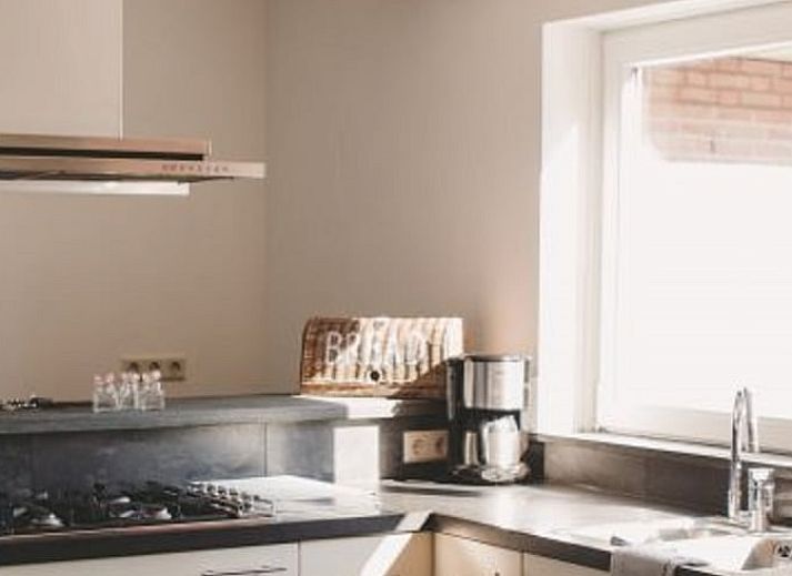 Gemuetliches Wohnzimmer im Ferienhaus in Rossum, ideal fuer Entspannung in Gelderland.