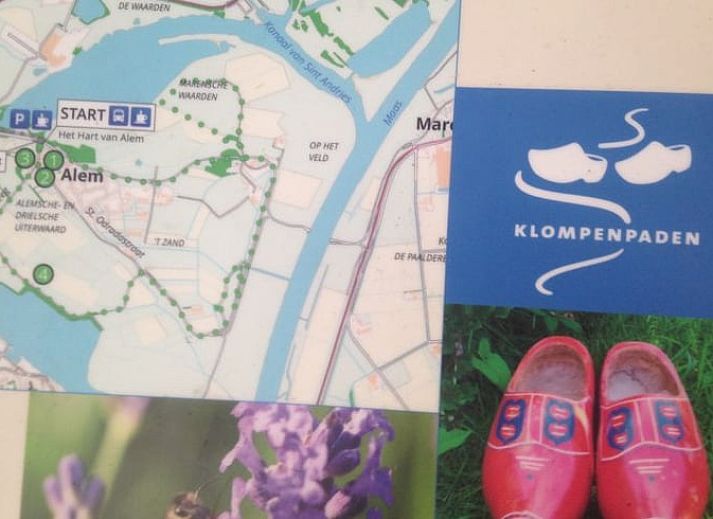 Esszimmer mit Aussicht im Ferienhaus in Rossum, ideal fuer Familienessen in Gelderland.