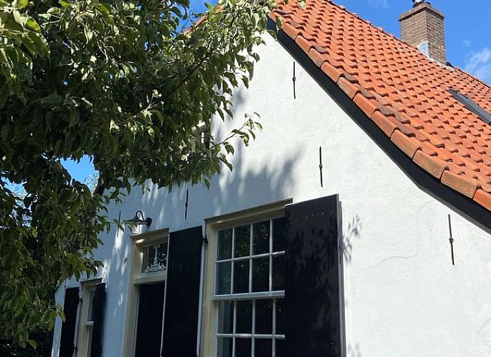 Charmant vakantiehuisje in Neerijnen met een prachtige tuin in het Rivierengebied, Gelderland.