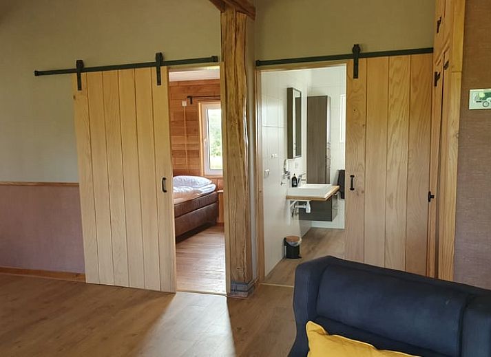 Huisje in Barchem met terras en uitzicht op paarden, vakantiehuis in Achterhoek, Gelderland.