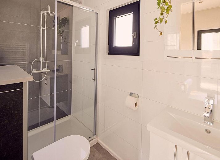 Rustic charm at Holiday Villa Boslodge 2 in Kotten, Achterhoek, overlooking lush nature and serene surroundings.