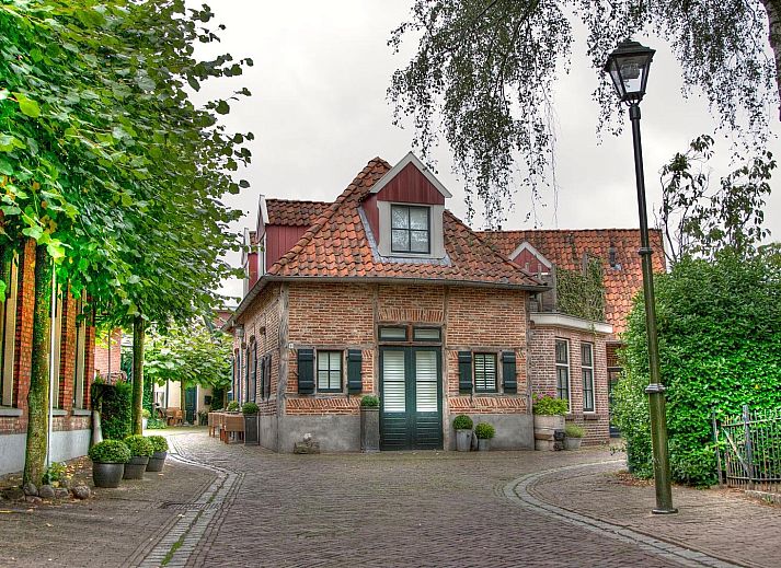 Geniessen Sie die ruhige Natur rund um die Ferienvilla Boslodge 2 mit Sauna in Kotten, Achterhoek, Gelderland mit schoenem Waldblick.