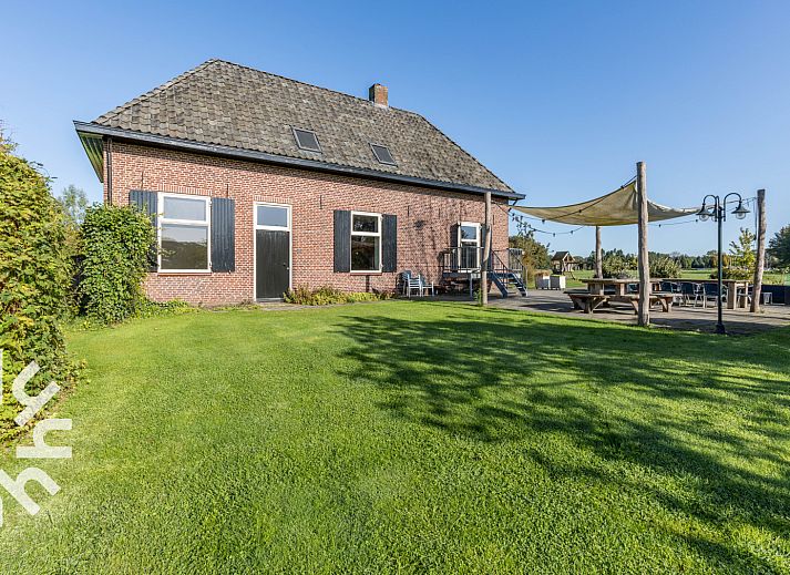Stylish dining room in vacation home DG303, Halle, Achterhoek, with wooden interior