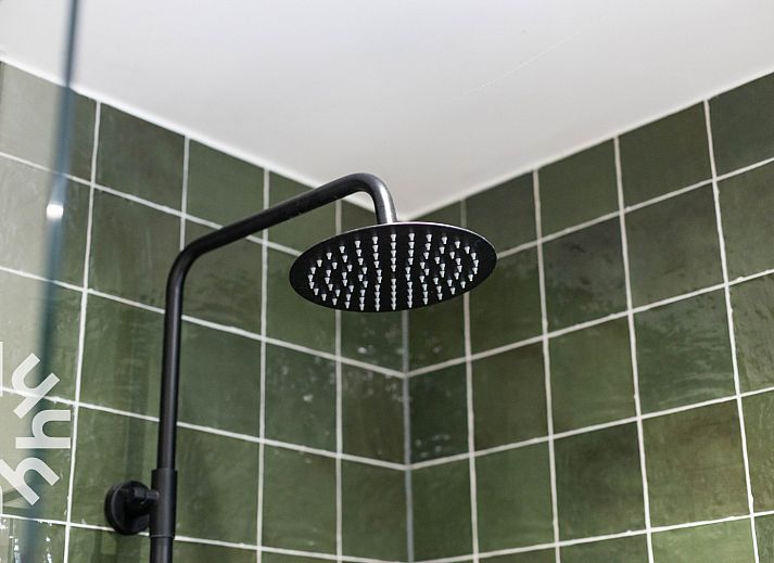 Picnic table in the garden of vacation home DG411 in Heelweg, Achterhoek.