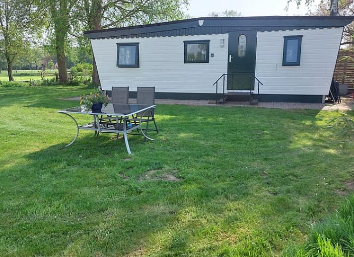 Ferienhaus in Zelhem, ein charmantes Ferienhaus in Achterhoek, Gelderland, mit einem gruenen Garten und laendlicher Umgebung.