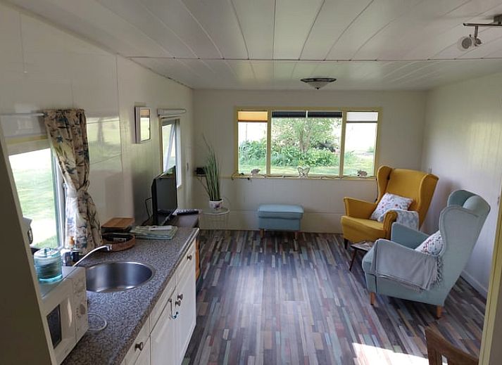 Ferienhaus in Zelhem, ein charmantes Ferienhaus in Achterhoek, Gelderland, mit einem gruenen Garten und laendlicher Umgebung.