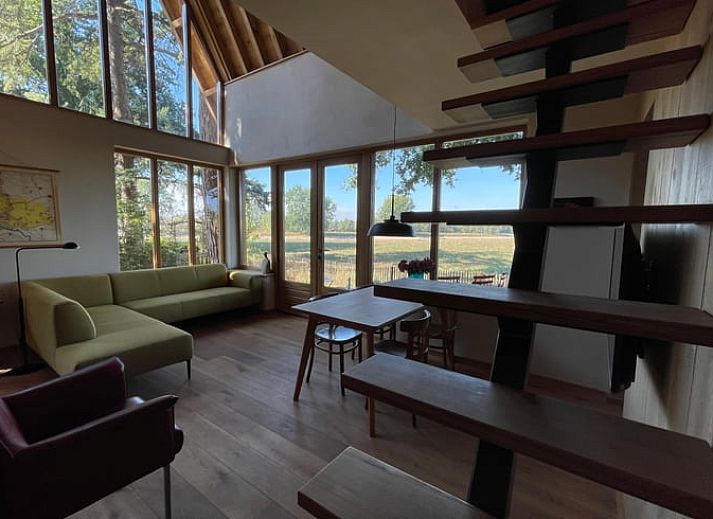 Ferienhaus in Epse, Achterhoek, Gelderland, umgeben von gruener Natur und Baeumen.