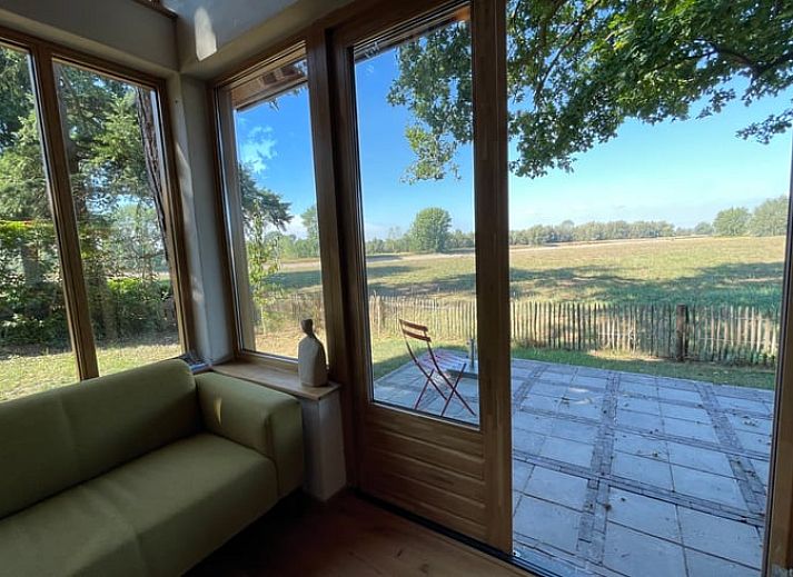 Atemberaubender Sonnenuntergang im Ferienhaus in Epse, Achterhoek, mit Blick auf den Fluss.