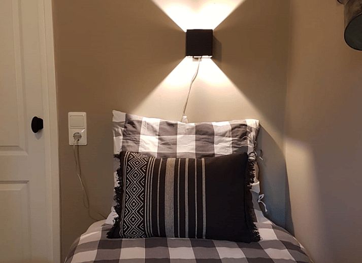 Gemuetliches Interieur des Ferienhauses in Ruurlo, Achterhoek, mit Holzinterieur und gemuetlicher Sitzecke in Gelderland.