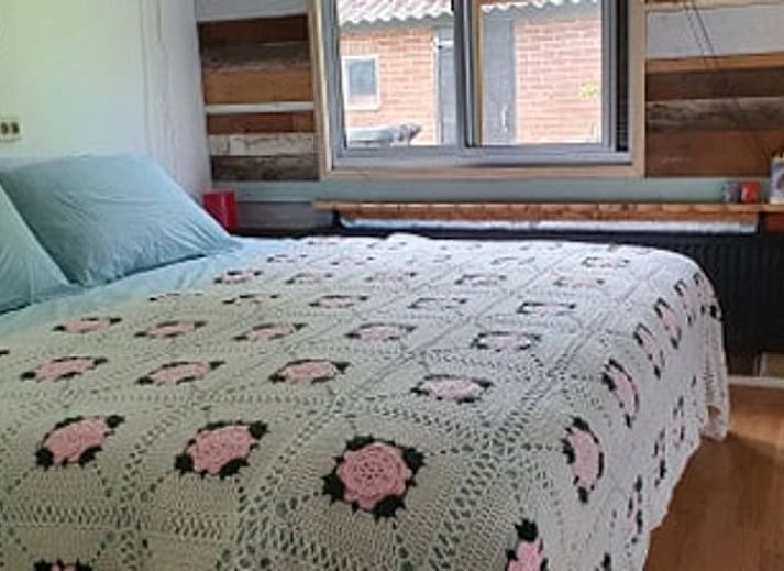 Cozy living room in Holiday Home in Ruurlo, Achterhoek, with spacious seating and views of the green nature of Gelderland.