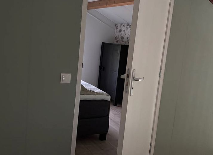 Gemuetliches Wohnzimmer im Ferienhaus in Ruurlo mit Blick auf den Garten in der Achterhoek.