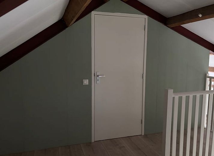 Esstisch und Kueche im Ferienhaus Cottage in Ruurlo, gelegen in Gelderland.