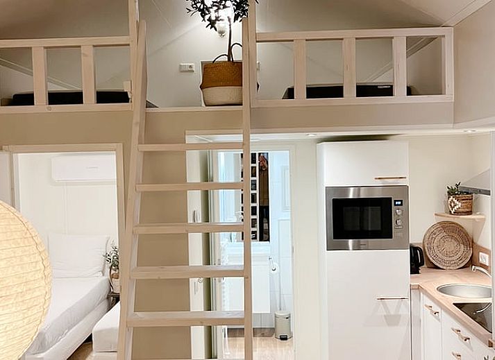 Stijlvolle binnenruimte van Huisje in Ruurlo, vakantiewoning in Ruurlo, Achterhoek.