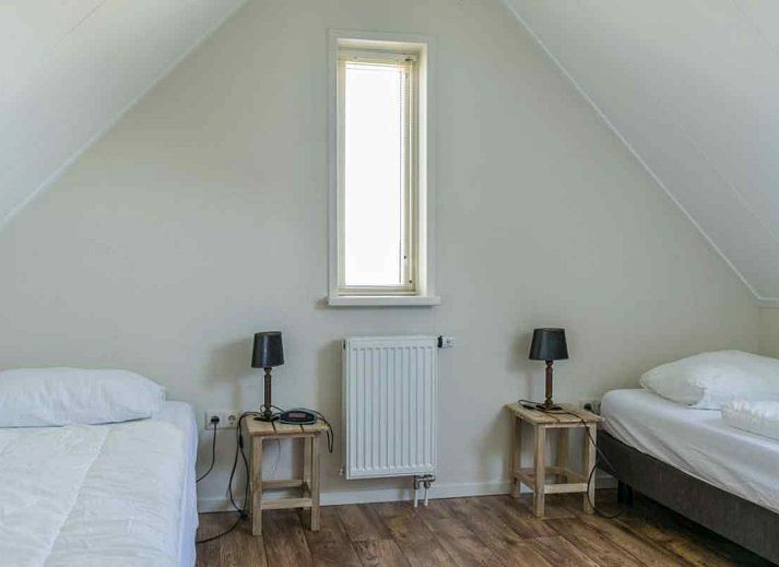 Modern bathroom of vacation home DG645 in Westendorp with double sink.