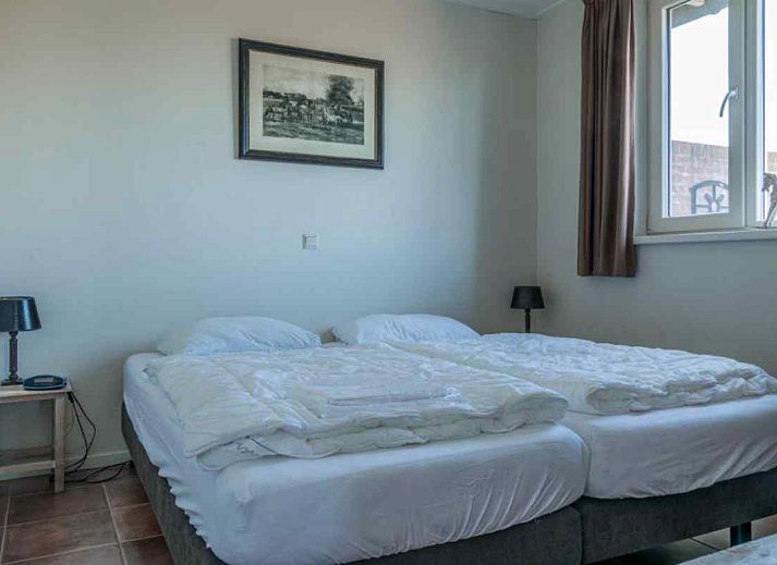 Modern bathroom of vacation home DG645 in Westendorp with double sink.