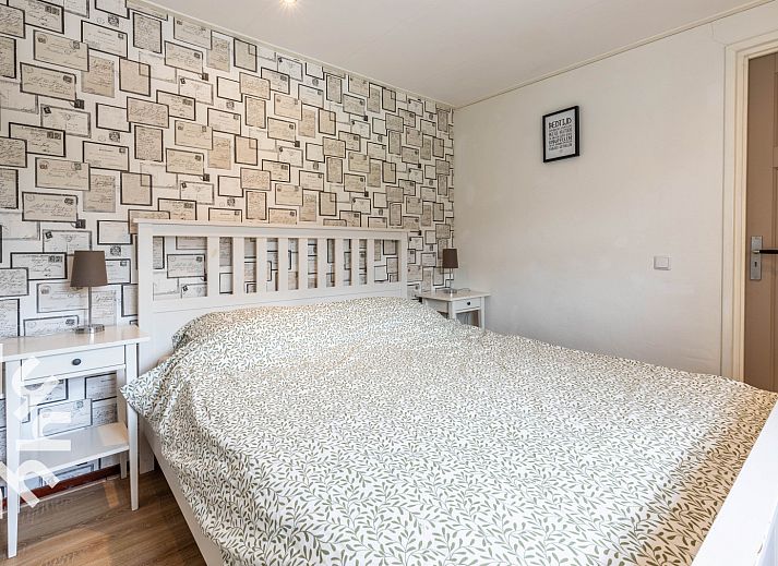 Kind geniet van een ritje op een skelter bij DG471, vakantiehuis in Aalten, Gelderland.