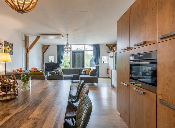 Huisje in Aalten, vakantiehuis in de Achterhoek met rustiek boerderijontwerp en groene omgeving in Gelderland.