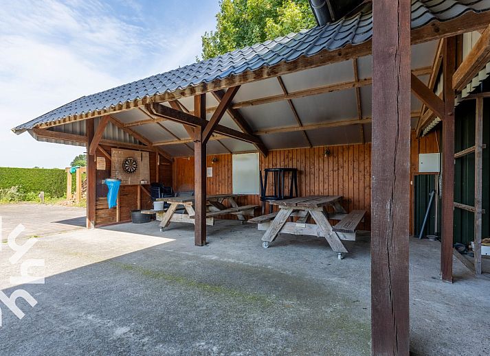 Cozy bedroom in DG168 vacation home, Aalten, with atmospheric murals.