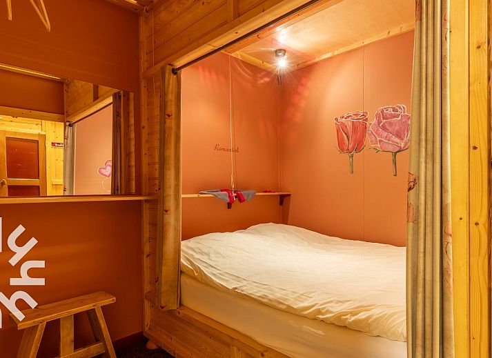 Cozy bar in DG168 vacation home, Aalten, Achterhoek with wooden interior.