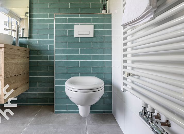 Stylish living room in vacation home DG1024, Aalten, Achterhoek with modern interior.