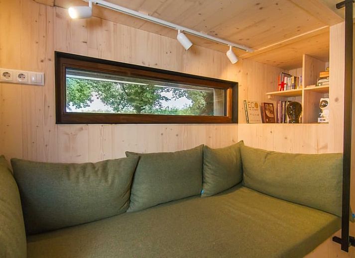 Huisje in Aalten, een vakantiehuis in de Achterhoek, Gelderland, omgeven door groene natuur en rustieke charme.