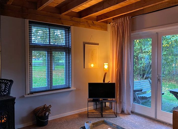 Aussenansicht von Cottage in Laren, einem charmanten Ferienhaus in Achterhoek, Gelderland, umgeben von natuerlicher Schoenheit.