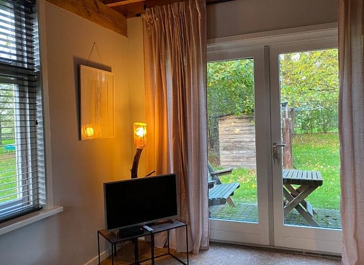 Aussenansicht von Cottage in Laren, einem charmanten Ferienhaus in Achterhoek, Gelderland, umgeben von natuerlicher Schoenheit.