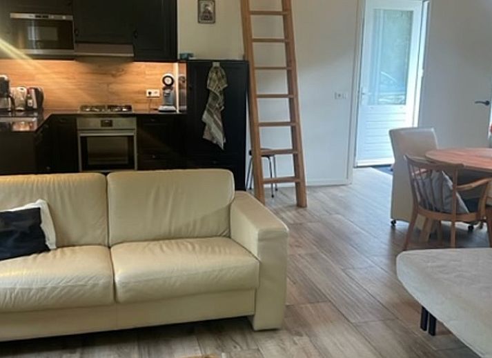 Modern bathroom in Holiday Home in Laren, Achterhoek, Gelderland with shower and sink, perfect for a comfortable stay.