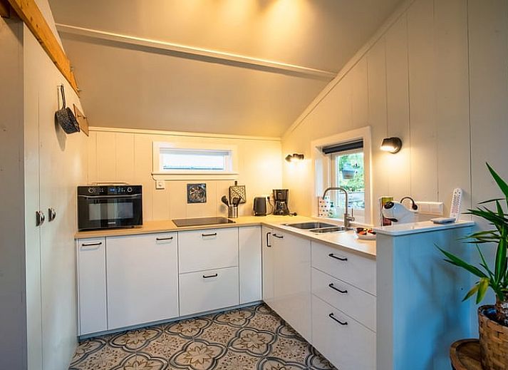 Geniessen Sie die Ruhe auf der Terrasse des Ferienhauses in Laren, das im gruenen Achterhoek, Gelderland liegt.