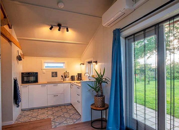 Geniessen Sie die Ruhe auf der Terrasse des Ferienhauses in Laren, das im gruenen Achterhoek, Gelderland liegt.