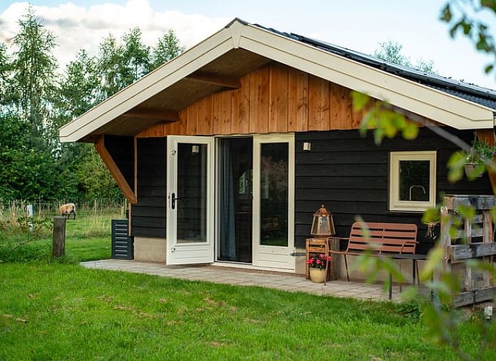 Schlafzimmer des Ferienhauses in Laren mit bequemen Betten, ideal fuer einen erholsamen Aufenthalt in Achterhoek, Gelderland.