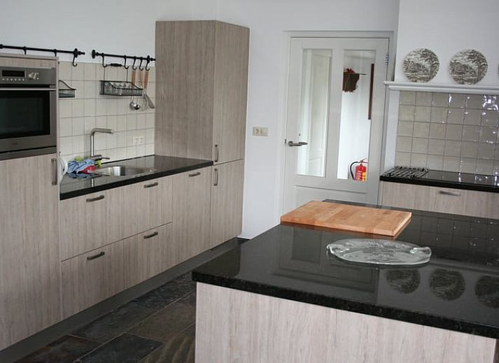 Lichte serre van Vakantiehuis in Groenlo, ideaal voor ontspanning in Achterhoek, Gelderland.