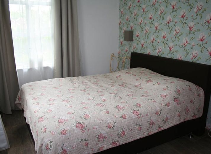 Gezellig terras bij Vakantiehuis in Groenlo met uitzicht op de natuur in Achterhoek, Gelderland.