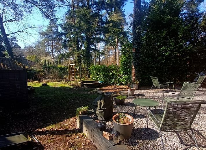 Cozy living room in cottage in Lochem with comfortable seating area in Gelderland.