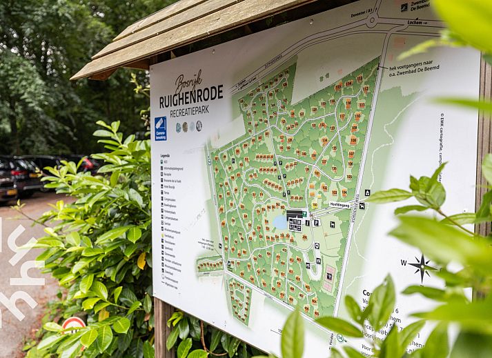 Bedroom in DG590 vacation home in Lochem, Achterhoek with comfortable bed and natural light.