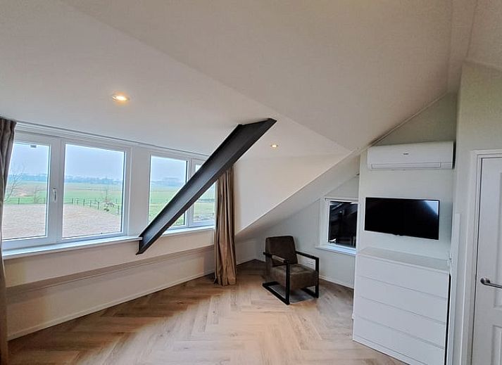 Vakantiehuisje in Lochem met groene tuin, ideaal voor een ontspannen verblijf in de Achterhoek, Gelderland.