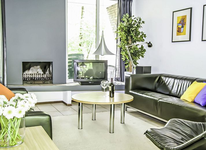 Ferienhaus 4L in Lochem, Achterhoek, umgeben von gruener Natur und Baeumen.